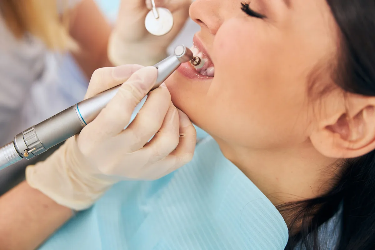 A patient having their teeth cleaned