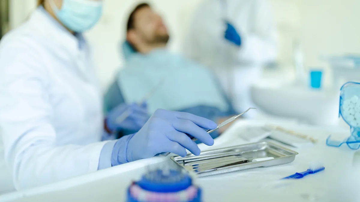 An instrument tray prepared in the treatment room